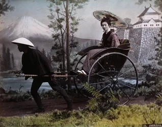 Jonge Japanse vrouw in een riksja, ca. 1890